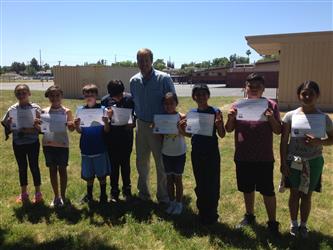 Kohler Safe School Ambassadors holding their certificates