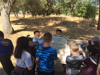 Westside students reading about how the Gold Rush began