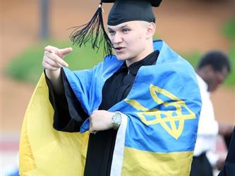 Photo of Foothill High School graduate in cap and gown.