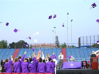 graduates celebrating