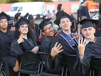 Photo of Foothill High School graduates in cap and gown.