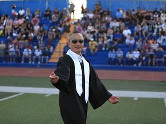 Administrator at high school graduation